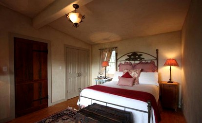 Romantic Log Cabin Retreat with Private Hot Tub Located in Fredericksburg, Texas - Fredericksburg, Texas - glamping.directory