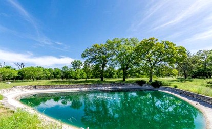 Romantic Log Cabin Retreat with Private Hot Tub Located in Fredericksburg, Texas - Fredericksburg, Texas - glamping.directory
