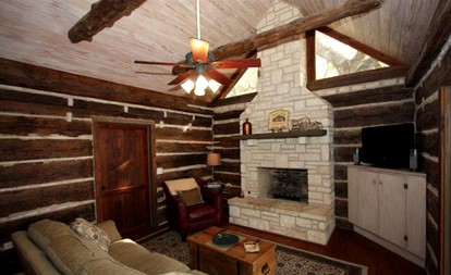 Romantic Log Cabin Retreat with Private Hot Tub Located in Fredericksburg, Texas - Fredericksburg, Texas - glamping.directory