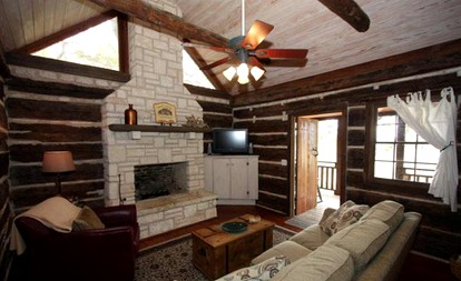 Romantic Log Cabin Retreat with Private Hot Tub Located in Fredericksburg, Texas - Fredericksburg, Texas - glamping.directory