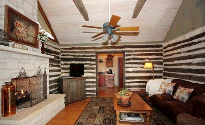 Romantic Log Cabin Retreat with Private Hot Tub Located in Fredericksburg, Texas - Fredericksburg, Texas - glamping.directory