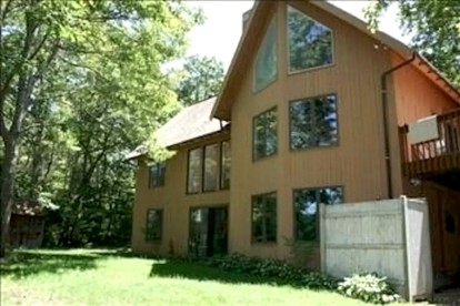 Pondside Vacation Rental with Deck and Private Beach Access in Cape Cod, Massachusetts - glamping.directory