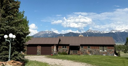 Charming Riverfront Guest House with Deck Overlooking Madison River, Near Ennis, Montana - glamping.directory