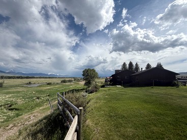 Charming Riverfront Guest House with Deck Overlooking Madison River, Near Ennis, Montana - Ennis, Montana - glamping.directory