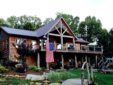 Cozy Cabin Rental near Water on Lake Shore Island in Guntersville, Alabama - glamping.directory