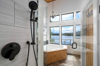 Luxury Lakefront Cabin with Breathtaking Living Spaces in New Hampshire - Conway, New Hampshire - glamping.directory