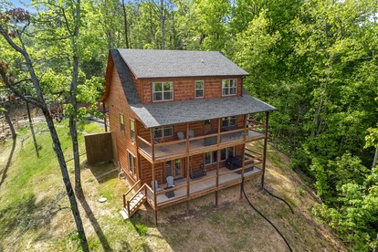 Charming Cabin with Indoor Pool and Balcony in Sevierville, Tennessee - glamping.directory