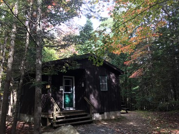 Rustic Cabin Retreat Nestled in the Forest near Lake Placid, New York - glamping.directory