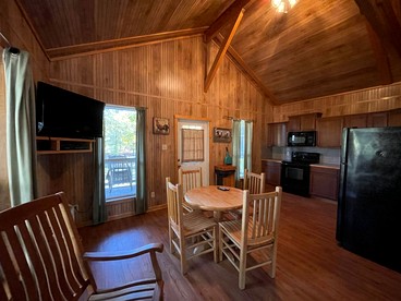 Scenic Waterfront Cabin with Covered Porch Overlooking Private Pond near Zwolle, Louisiana - Zwolle, Louisiana - glamping.directory