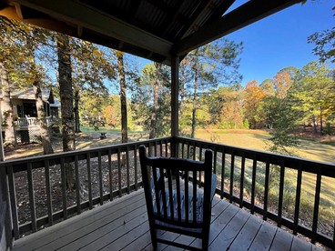 Scenic Waterfront Cabin with Covered Porch Overlooking Private Pond near Zwolle, Louisiana - Zwolle, Louisiana - glamping.directory