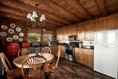 Stunning Secluded Log Cabin with River Access in Paw Paw, Maryland - Paw Paw, Maryland - glamping.directory