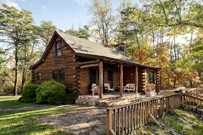 Stunning Secluded Log Cabin with River Access in Paw Paw, Maryland - glamping.directory