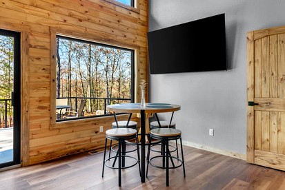 Tranquil Riverside Cabin with Expansive Trails near Elkins, Arkansas - Fayetteville, Arkansas - glamping.directory