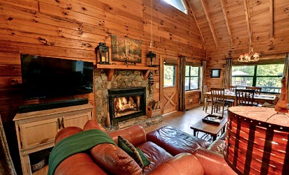 Luxurious Log Cabin Rental with a Fishing Pond in Cherry Log, Georgia - Cherry Log, Georgia - glamping.directory