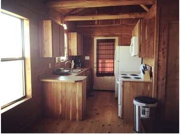 A Rustic Log Cabin - Perfect for a Glamping Getaway by the San Marcos River near Kingsbury, Texas - Kingsbury, Texas - glamping.directory