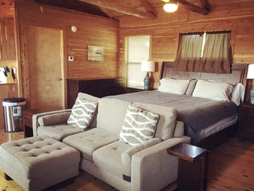 A Rustic Log Cabin - Perfect for a Glamping Getaway by the San Marcos River near Kingsbury, Texas - Kingsbury, Texas - glamping.directory