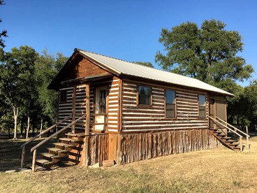 A Rustic Log Cabin - Perfect for a Glamping Getaway by the San Marcos River near Kingsbury, Texas - Kingsbury, Texas - glamping.directory