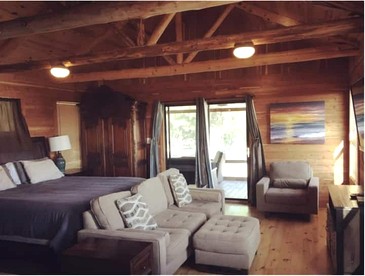 A Rustic Log Cabin - Perfect for a Glamping Getaway by the San Marcos River near Kingsbury, Texas - Kingsbury, Texas - glamping.directory