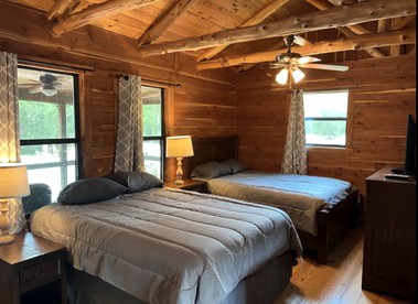 A Rustic Log Cabin - Perfect for a Glamping Getaway by the San Marcos River near Kingsbury, Texas - Kingsbury, Texas - glamping.directory