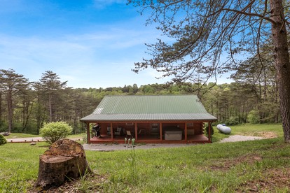 Serene and Secluded Log Cabin with Private Hot Tub in Hocking Hills, Perfect for a Family Glamping Retreat in Southeastern Ohio - glamping.directory