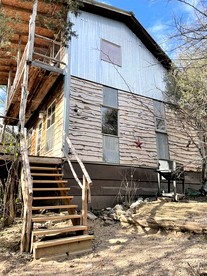 Two-Story Cabin Rental for Large Groups along Hamilton Creek in Marble Falls, Texas - Marble Falls, Texas - glamping.directory