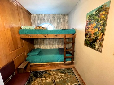 Two-Story Cabin Rental for Large Groups along Hamilton Creek in Marble Falls, Texas - Marble Falls, Texas - glamping.directory