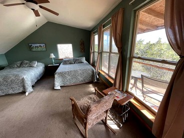 Two-Story Cabin Rental for Large Groups along Hamilton Creek in Marble Falls, Texas - Marble Falls, Texas - glamping.directory