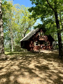 Peaceful Luxury Cabin with Floor-to-Ceiling Glass Views & Historic Gas Log Near Cloudland Canyon, Mentone, Alabama - Mentone, Alabama - glamping.directory