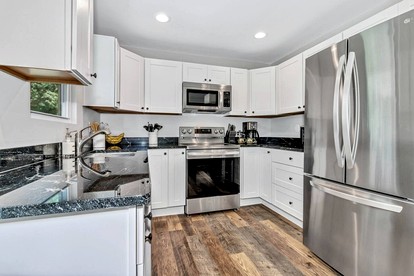 Charming Cottage with Spacious Backyard and Covered Porches Near Downtown Black Mountain, NC - Black Mountain, North Carolina - glamping.directory