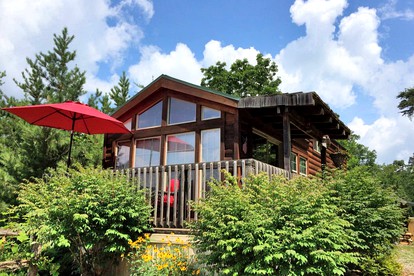 Rustic Newport Cabin with a Hot Tub Ideal for a Vacation in Tennessee - glamping.directory