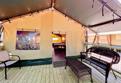 Texas Creekside Safari Tent Glamping Perfect for Nature Retreats for Water Sports Enthusiasts - Kingsbury, Texas - glamping.directory