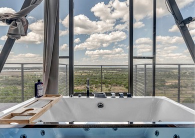 Stunning A-Frame with Folding Glass Walls & Open-Air Living in Cottonwood, Texas - Cottonwood Shores, Texas - glamping.directory