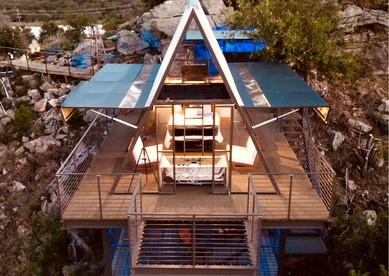Stunning A-Frame with Folding Glass Walls & Open-Air Living in Cottonwood, Texas - glamping.directory