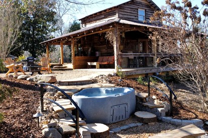 Historic Restored Tobacco Barn Retreat with Private Hot Tub near Pilot Mountain in Tobaccoville, North Carolina - glamping.directory