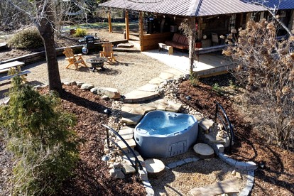 Historic Restored Tobacco Barn Retreat with Private Hot Tub near Pilot Mountain in Tobaccoville, North Carolina - Tobaccoville, North Carolina - glamping.directory