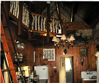 Rustic Lakeside Cabin Rental with a Paddleboat and Canoe in Rhinelander, Wisconsin - Rhinelander, Wisconsin - glamping.directory