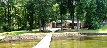 Waterfront Cottage with Private Beach on Tennessee River in Guntersville, Alabama - glamping.directory