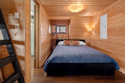 Incredible Sunset at Beachfront Glamping Cabin on Private, Herron Island with Fire Pit and Kayaking near Olympia, Washington - Lakebay, Washington - glamping.directory
