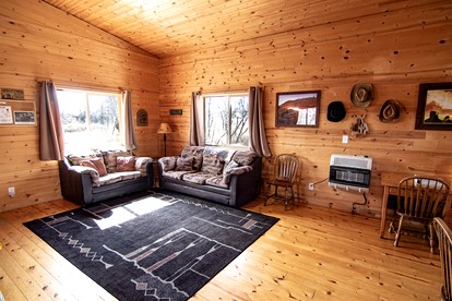 Rustic Cabin Rental with Porch at Foot of Abajo Mountains near Moab, Utah - Monticello, Utah - glamping.directory