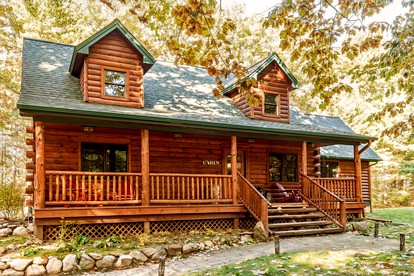 Panorama Paradise: Big Group Log Cabin Retreat in Bellaire, Michigan - glamping.directory