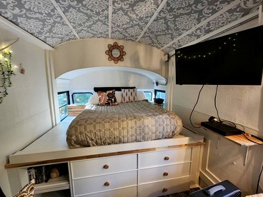 Rustic Converted School Bus with Outdoor Shower Near ORV Trails in Manistee National Forest, Michigan - Bitely, Michigan - glamping.directory