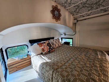 Rustic Converted School Bus with Outdoor Shower Near ORV Trails in Manistee National Forest, Michigan - Bitely, Michigan - glamping.directory