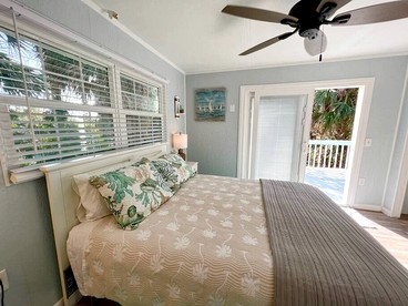 Charming Waterfront Cottage with Private Dock near Little Gasparilla Island, Florida - Placida, Florida - glamping.directory