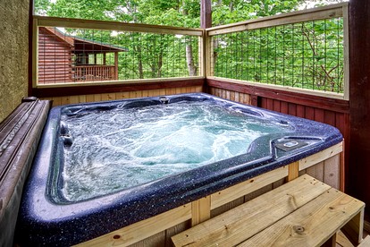 Spacious Cabin Retreat with Hot Tub & Games near Dollywood in Pigeon Forge, TN - Pigeon Forge, Tennessee - glamping.directory