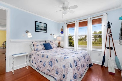 Creekside Cottage with Sunroom and Fire Pit - with Plenty of Outdoor Space Near Assateague Island in Chincoteague, VA - Chincoteague, Virginia - glamping.directory