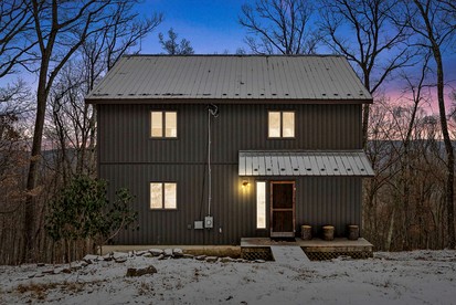 Charming Post-and-Beam Mountain Cabin with Hot Tub Near Berkeley Springs | Great Cacapon, WV - glamping.directory