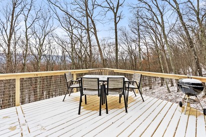 Charming Post-and-Beam Mountain Cabin with Hot Tub Near Berkeley Springs | Great Cacapon, WV - Great Cacapon, West Virginia - glamping.directory