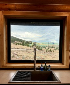 Rustic Mountain Cabin Retreat with Wrap-Around Porch & Scenic Views Near Livingston, Montana - Livingston, Montana - glamping.directory