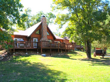 Family-Friendly Log Cabin with a Pool and Playground near the Ozarks, Missouri - glamping.directory