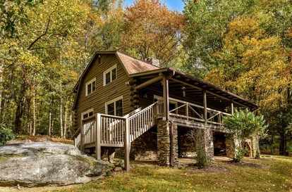 Secluded Log Cabin Rental with Private Hot Tub near Asheville, North Carolina - glamping.directory